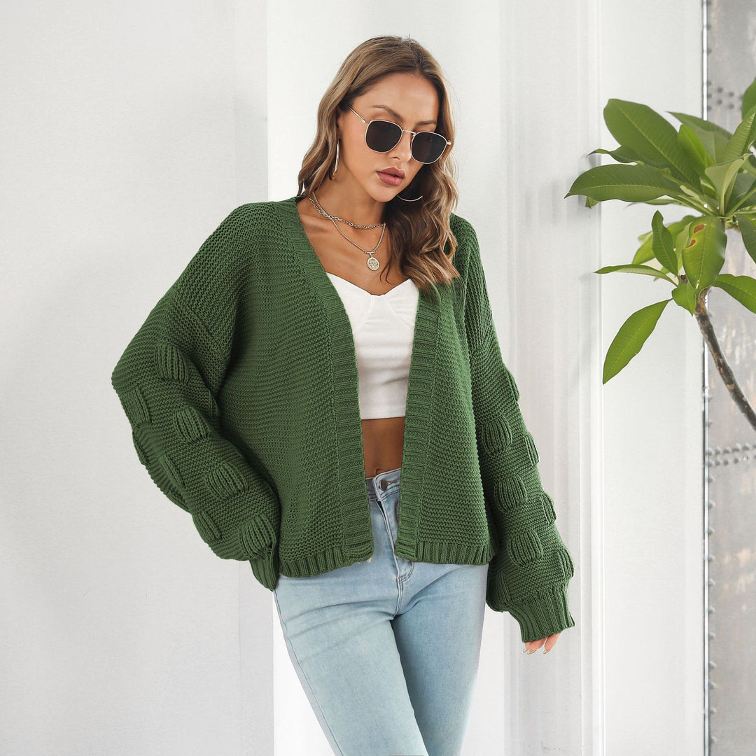 Grovstrikket cardigan med puffermer
