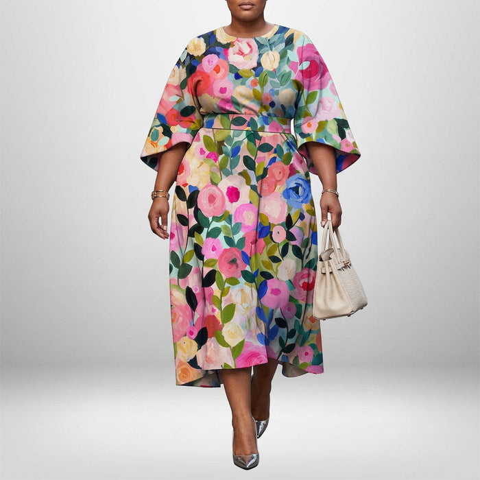 BONNIE | Bloom Print Midi med Skulpturert Midje og Flytende Eleganse