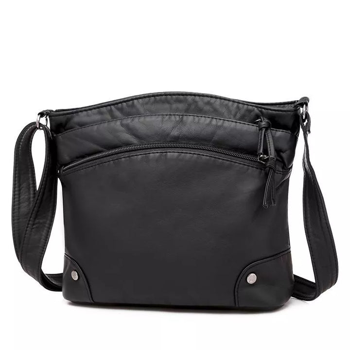 Romilly - Crossbody Skinnveske