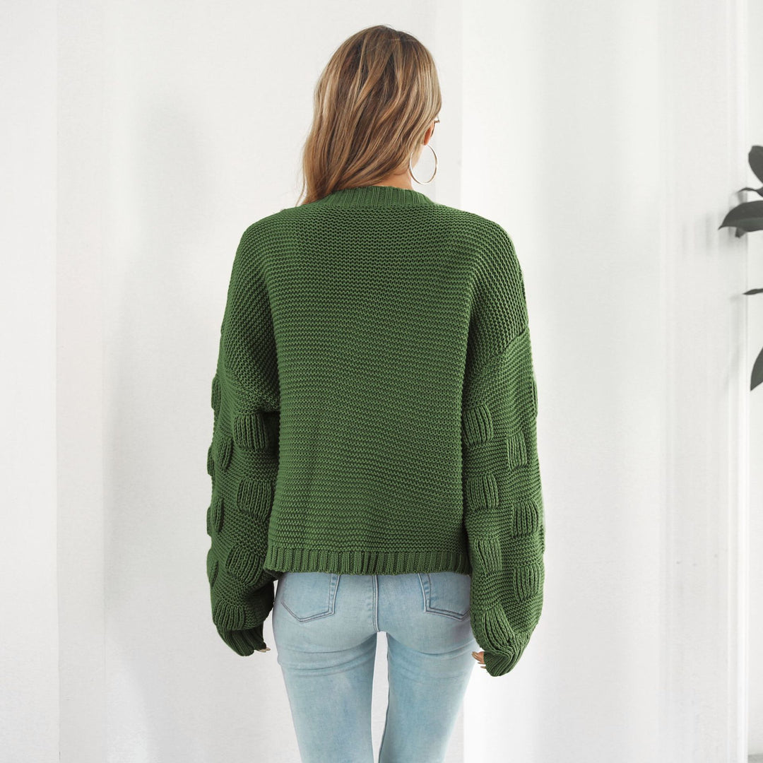 Grovstrikket cardigan med puffermer