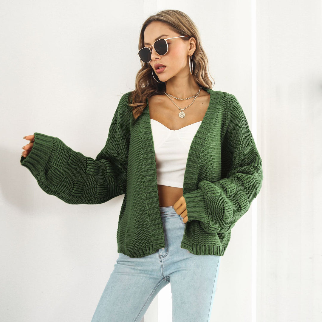 Grovstrikket cardigan med puffermer