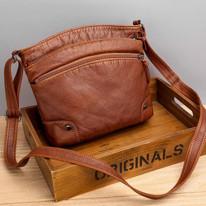Romilly - Crossbody Skinnveske
