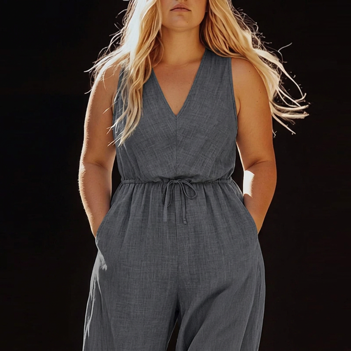 Lark – Uformell Ermeløs Jumpsuit med Snøring og Lommer