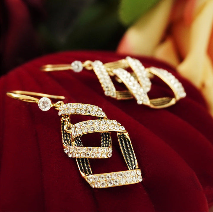 Signy Virelle Lagdelte Øredobber | Gull