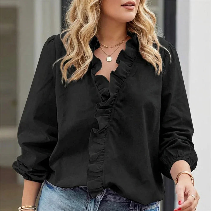 Magnolia | Feminine Bluse med Lekne Volanger