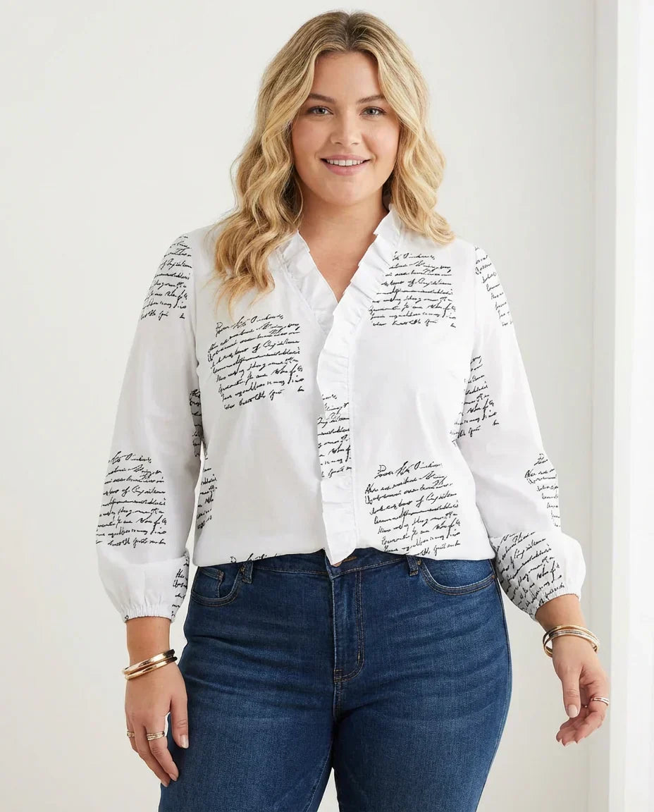 Magnolia | Feminine Bluse med Lekne Volanger