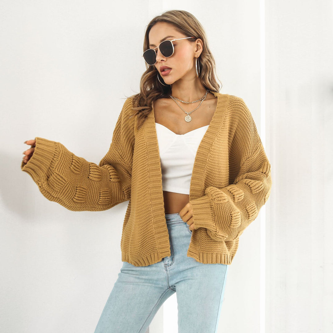 Grovstrikket cardigan med puffermer