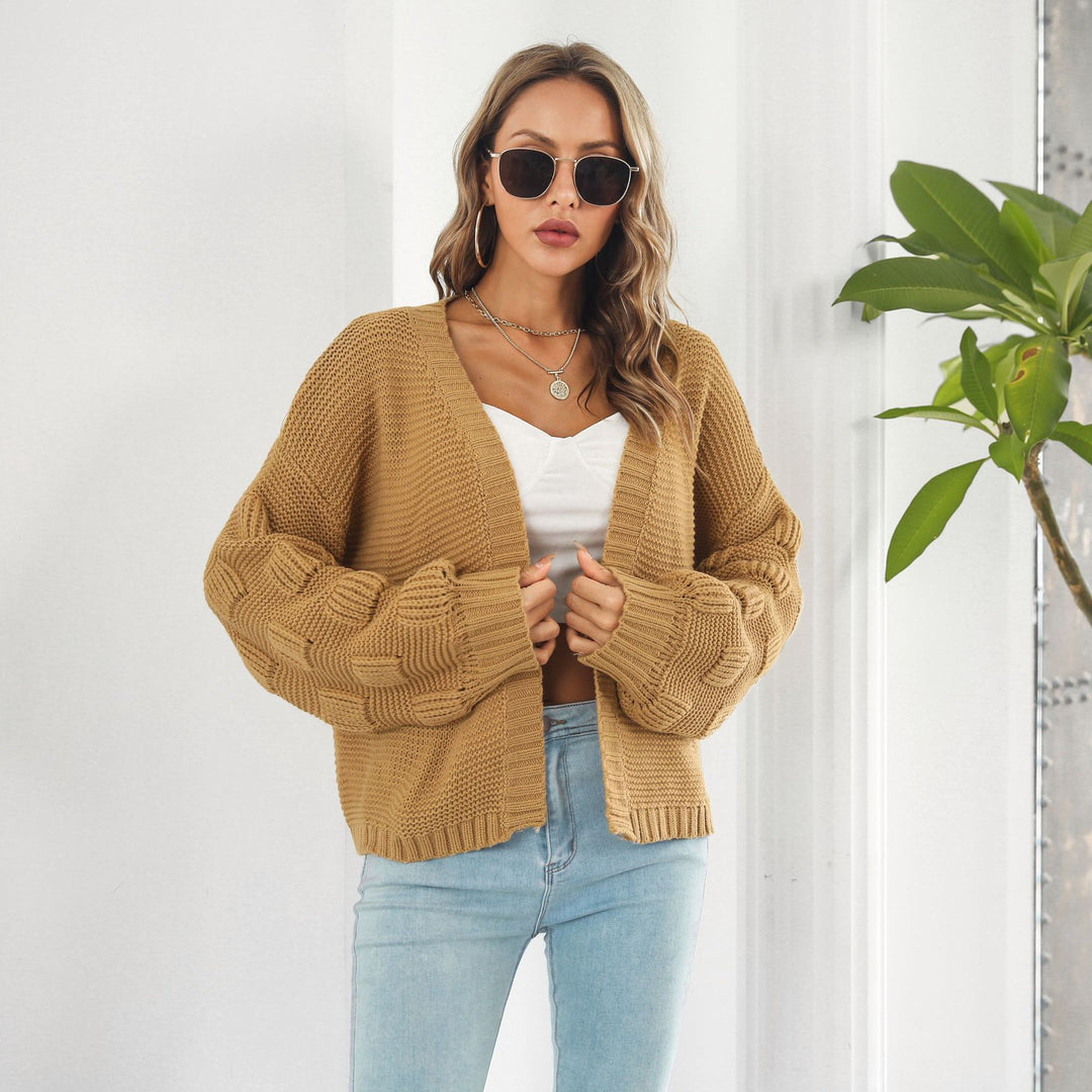 Grovstrikket cardigan med puffermer
