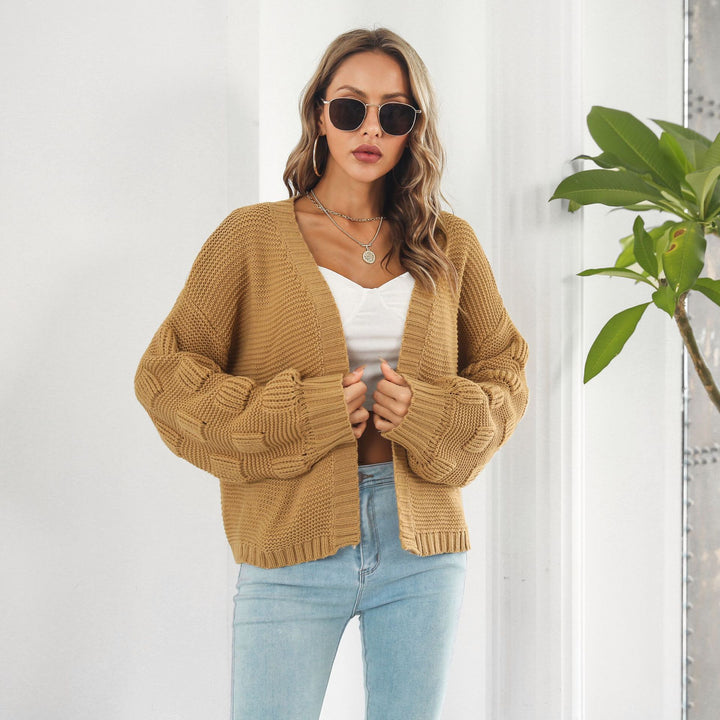 Grovstrikket cardigan med puffermer