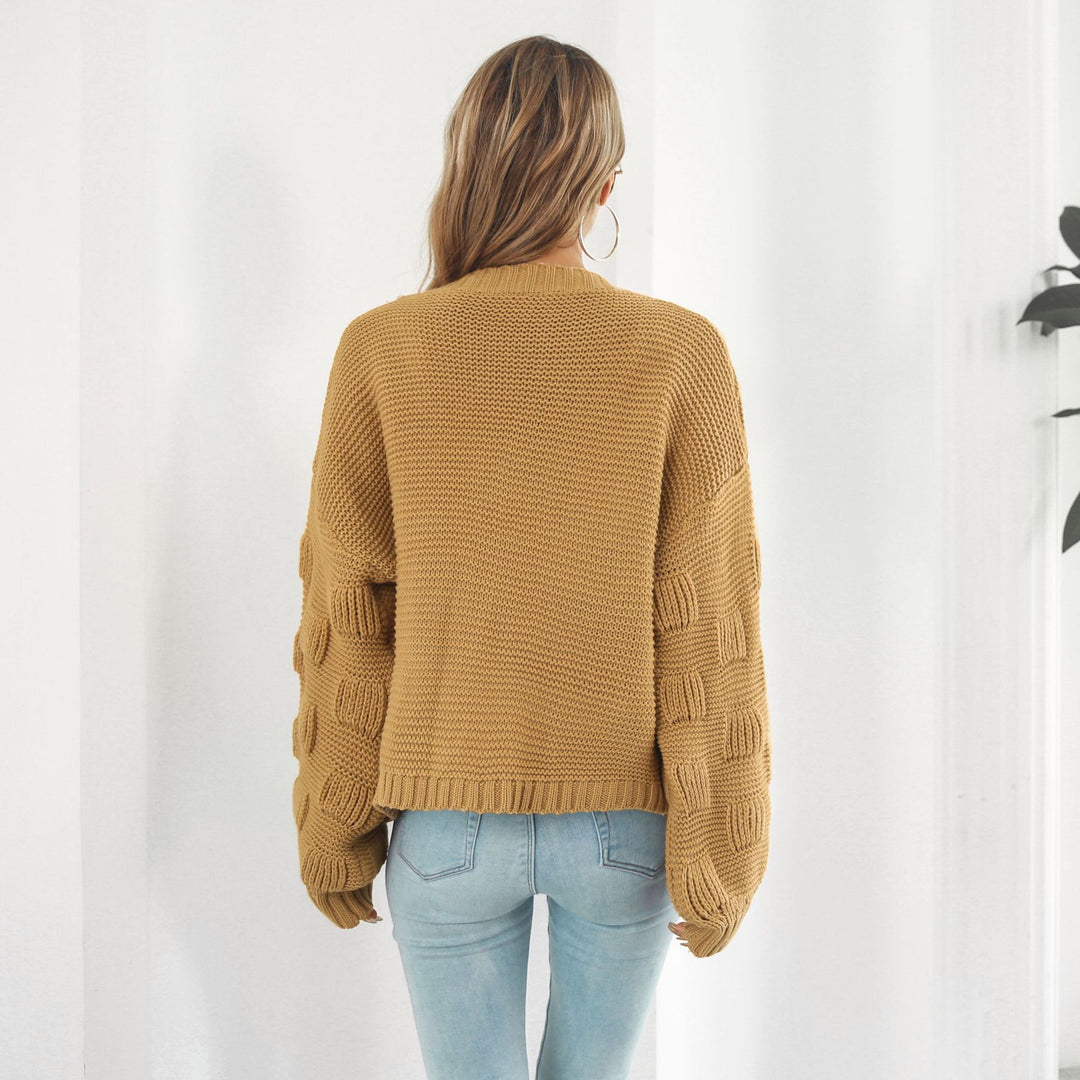 Grovstrikket cardigan med puffermer