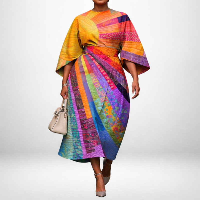 EVADNE | Patchwork Midi med Formet Midje og Uttrykkelige Ermer